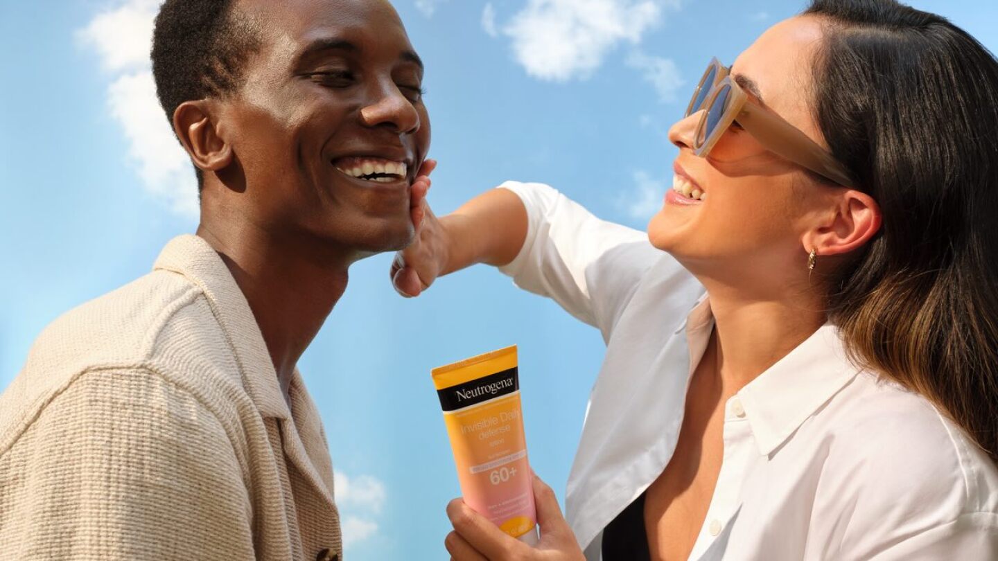 Woman applying sunscreen for sun protection